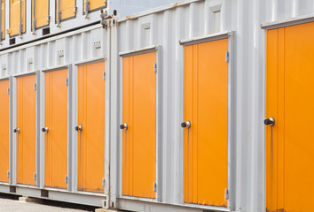 Naklejka na ściany i meble Exterior of storage unit or small warehouse for rental
