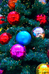 Fototapeta na wymiar Xmas background Christmas tree with colorful balls
