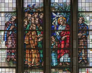 BRUSSELS - JUNE 22: Jesus benedicte the Apostle from windowpane of National Basilica of the Sacred...