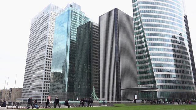 Time lapse Business district employees establishing shot, Paris. Establishing shot time lapse of some buildings and people on the business district of La Défense, Paris - 1080p - 60fps