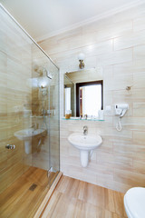 small bathroom of the hotel rooms, with shower and washbasin
