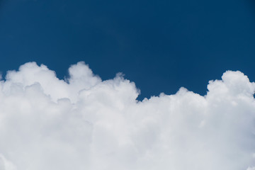 Naklejka na ściany i meble Cumulus cloudscape with blue sky