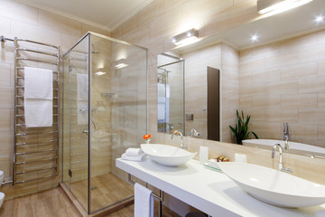 bathroom of the hotel rooms, with a shower and a few washbasins - obrazy, fototapety, plakaty
