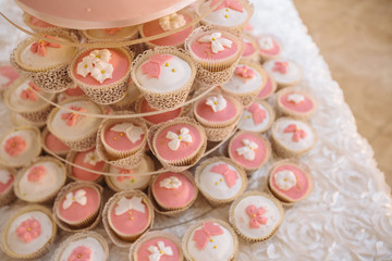Candy bar. Table with sweet 
candies. Wedding cake