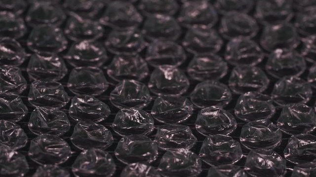 packaging film bubbles on a black background