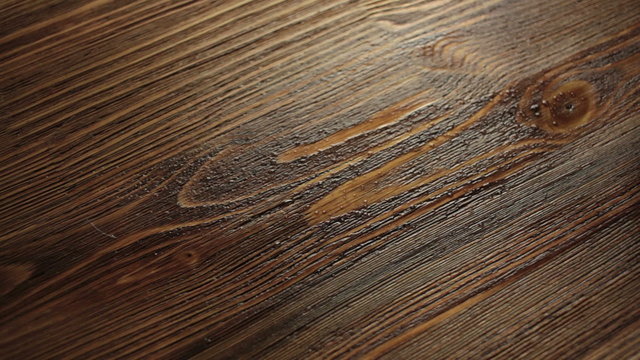 Wood painting with a brush with the brown color