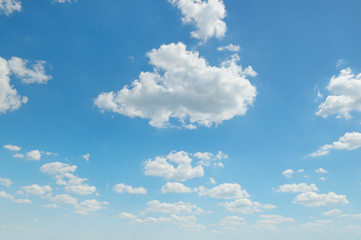 cumulus clouds in the blue sky