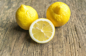 Fototapeta na wymiar Fresh slice lemon on the wooden table.