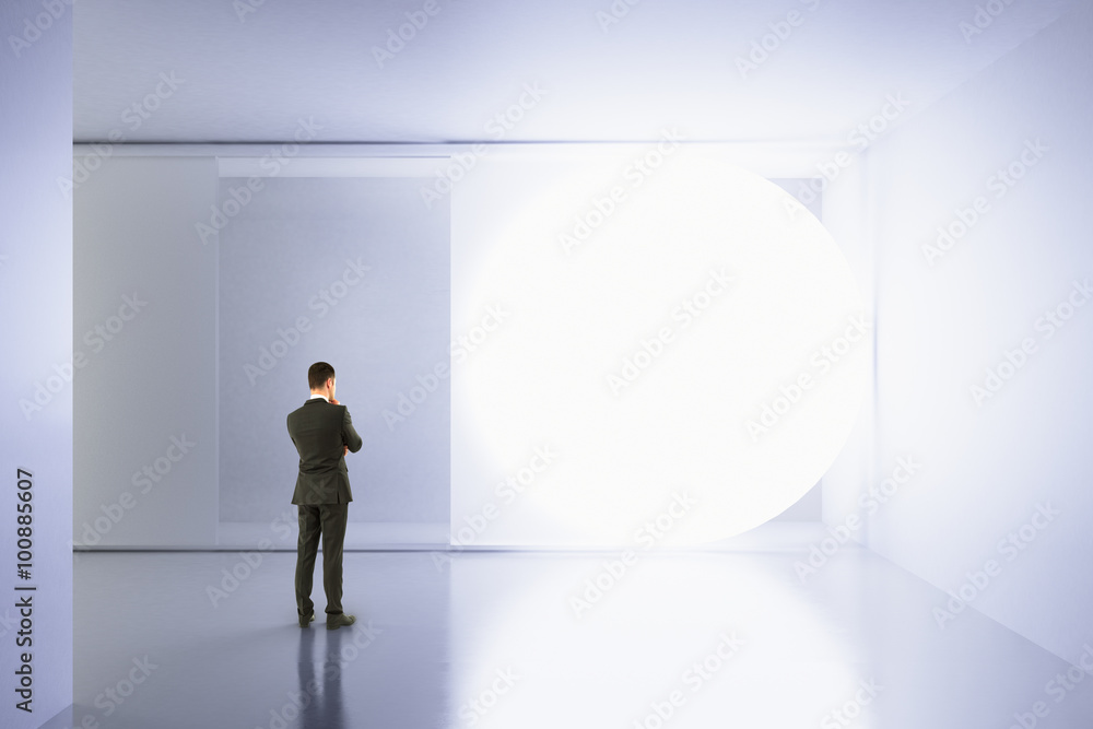 Poster a man stands in an empty white room with copy space