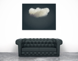 Interior art with a sofa and a black picture of a cloud