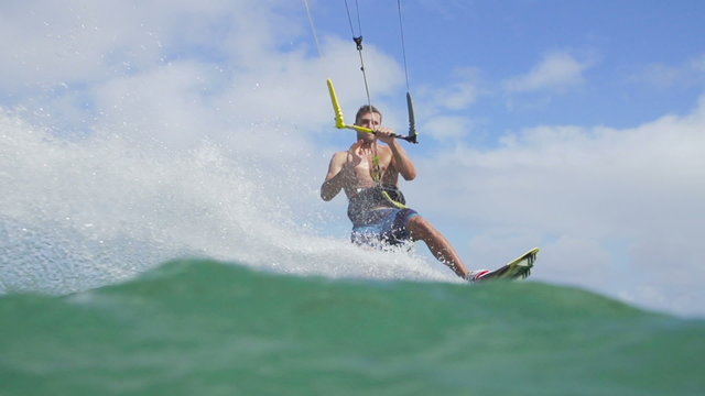 Young Man Kite Surfing In Ocean, Extreme Summer Sport