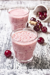 smoothie with cherry in a glass