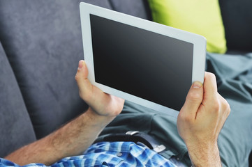 Man networking on tablet
