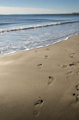empreintes à la plage