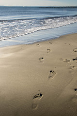 empreintes à la plage