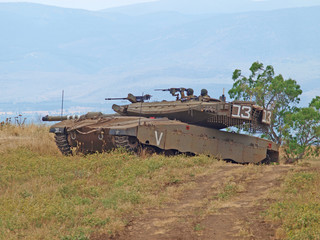Merkava tanks and Israeli soldiers in training armored forces