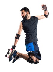 Man with skateboard jumping