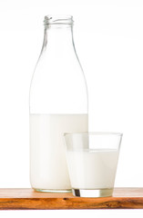 bottle of milk on wood