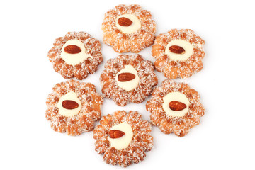 Six cookies sprinkled with coconut