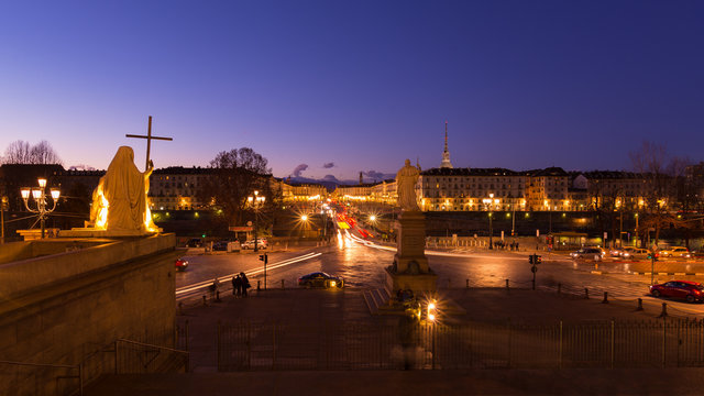 Cityscape of Torino (Turin, Italy) at dusk, blurred motion