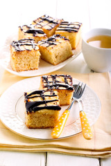 Cream and chocolate glaze topping blondie