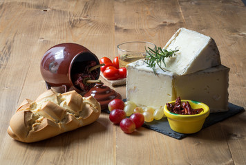 Close-up of grape,mint,rosemary,cheese and tomatoes