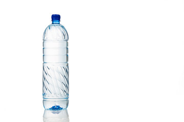 Single refreshing mineral water in plastic bottle in white background