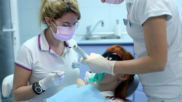 Drying Inlays with UV Curing Light in Dental Procedure
