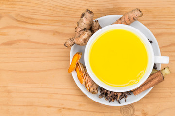 Aromatic milk tea with ginger roots, cinnamon, cloves and black pepper offers many wellness health benefits