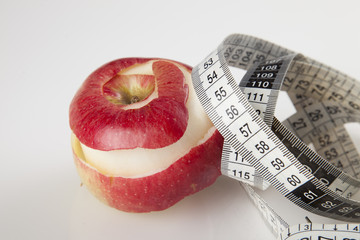 apple and tape measure
