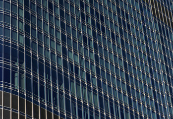 columns of windows on a huge modern building