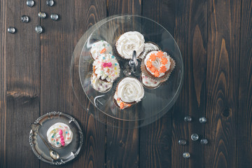 Cup cake on the rustic table.