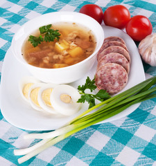 Soup and a variety of vegetables