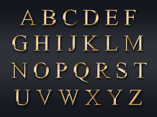 Golden alphabet on a grey background