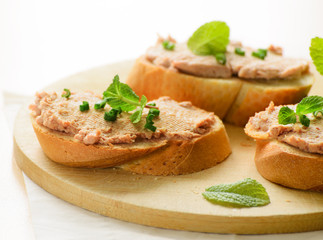 Sandwiches with paste and green onions.