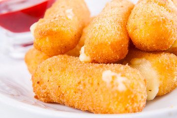 Fried cheese sticks with sauce