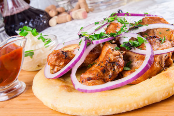 Grilled meat on pita bread