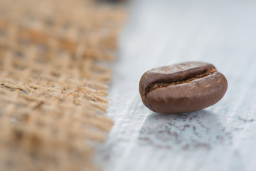 Coffee beans lying on the table 