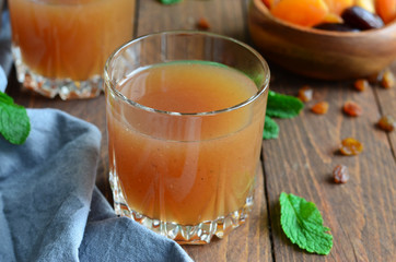 Dried Fruit Drink on a wooden background
