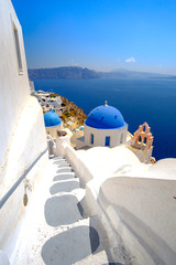 Scenic view of white houses and blue domes in Santorini