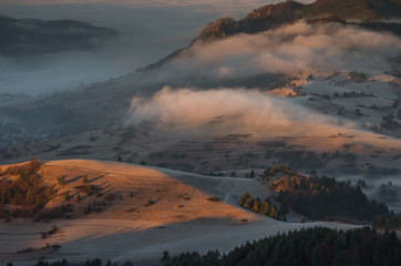 Fototapeta premium Mists and clouds above mountains in the morning, Pieniny, Poland and Slovakia