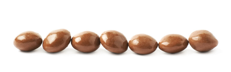 Chocolate glazed nut candies isolated