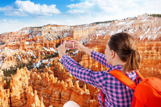 Close portrait of woman take Bryce canyon picture