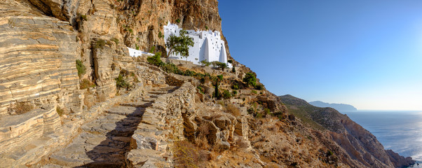 Panoramic view of Panagia Hozoviotissa monastery on Amorgos isla - obrazy, fototapety, plakaty