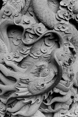 Dragon low bas sculpture on wall