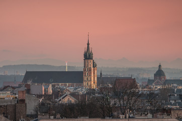 Obraz premium Krakow, Poland, St Mary's church over old town in the evening