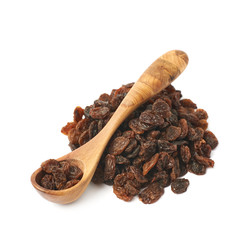 Wooden spoon over the pile of raisins