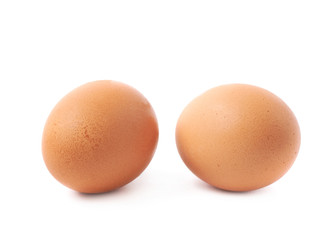 Two brown eggs composition isolated