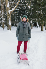 Young man with a sledge
