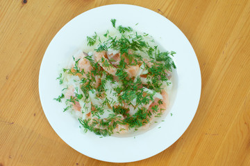 Home marinated Salmon with dill on a wooden background
